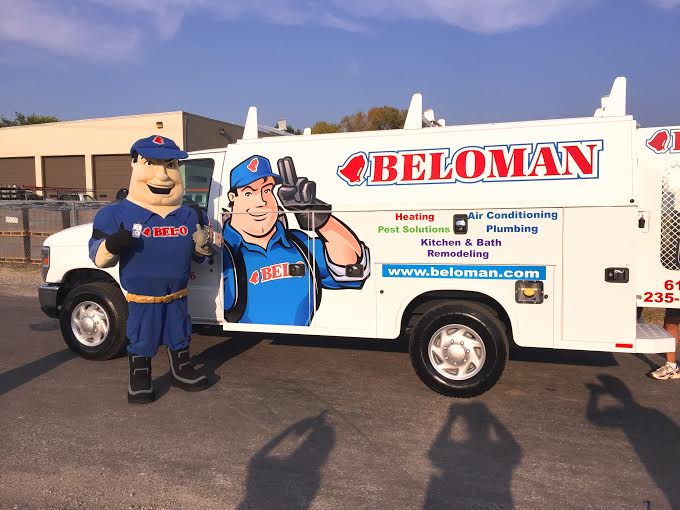 BELOMAN Mascot in Front of Company Vehicle