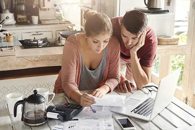 Couple Paying Utility Bills